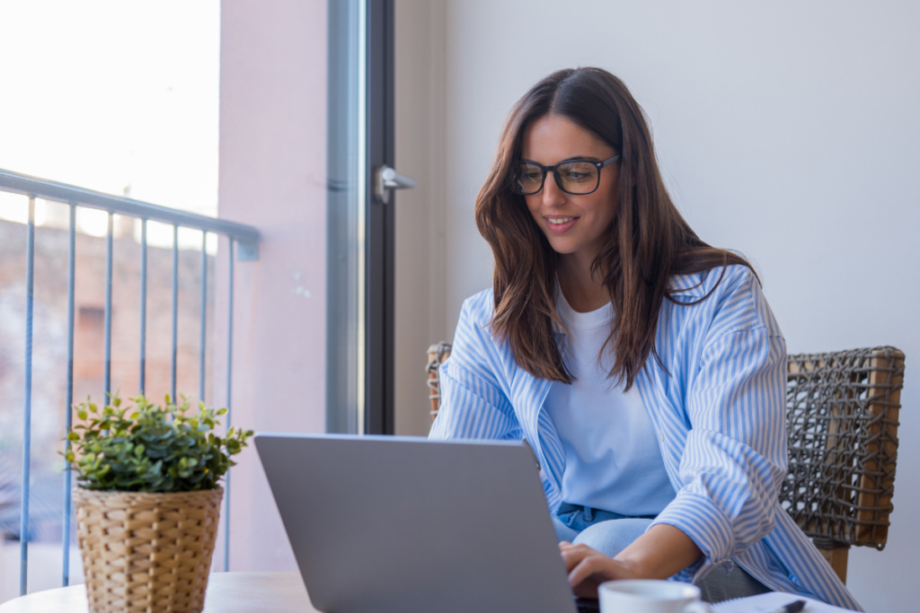 gen z woman using a laptop